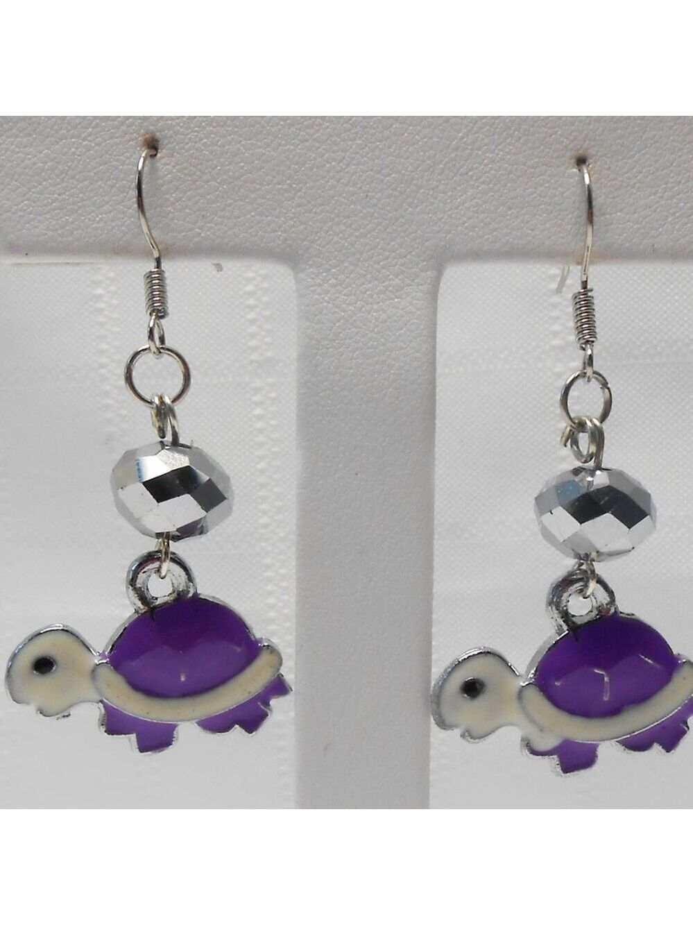 No 672 Handmade earrings with enameled silver turtles charms